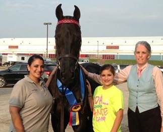 Alvin, his owners, & me. Photo by Mariah Bouchet.