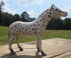 Spotted out standing in her field.