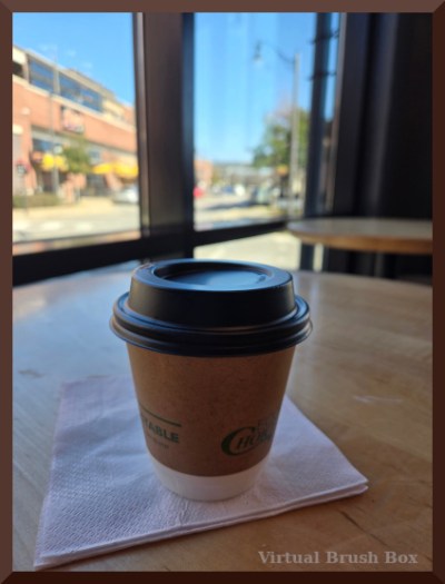 photo of cup on table in coffee shop