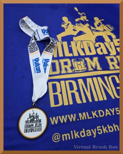 Photo of a medal lying on a tablecloth