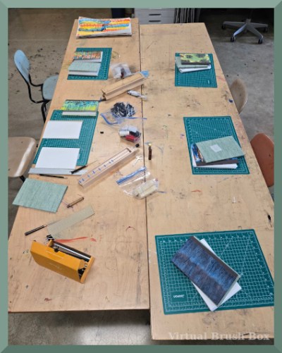 photo of tables with bookmaking supplies