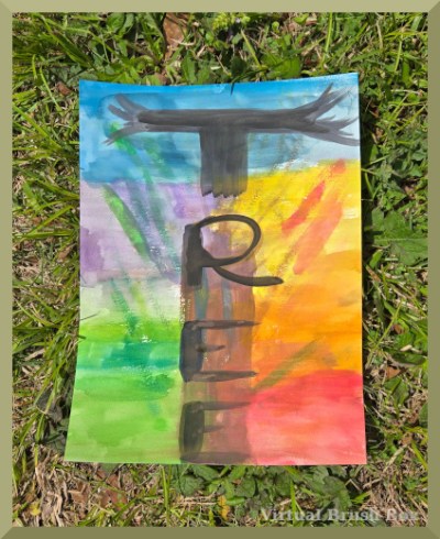 watercolor painting lying on grass