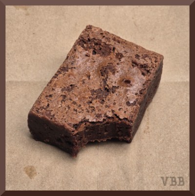 photo of a brownie with a bite out of the corner