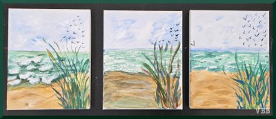 photo of a three paintings of a seashore