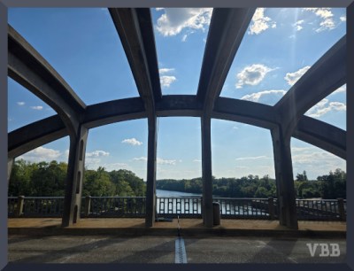 photo closeup of the arch of a bridge
