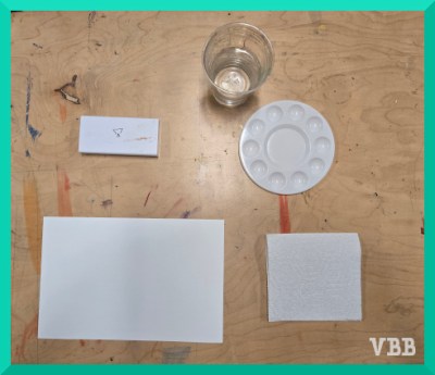 photo of a tabletop with clean art supplies