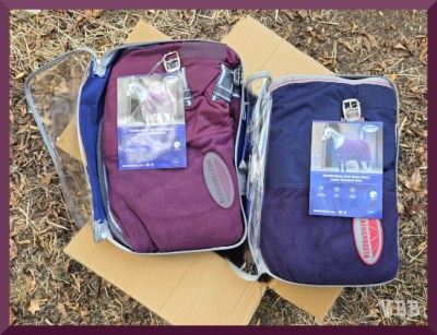 Photo of two folded blankets resting on a cardboard box