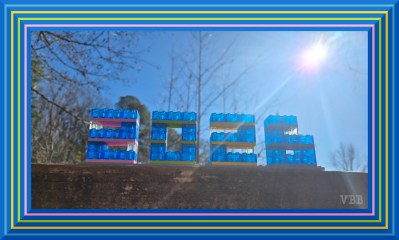Photo sun shining through numbers 2026 built from clear blue LEGO bricks