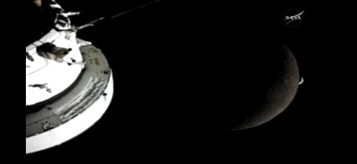 Image from Artemis II containing the edge of the space ship, the moon, the Earth, & the NASA logo