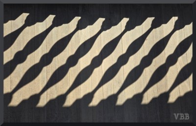 Photo of a porch railing on a wooden floor
