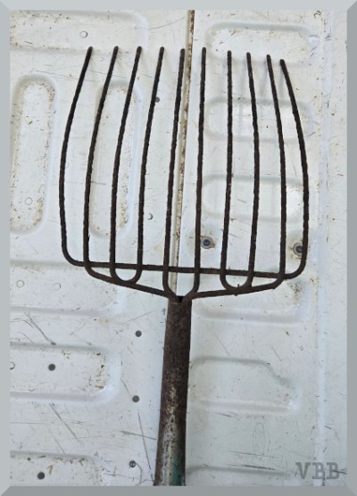 Photo of the tines of a pitchfork.