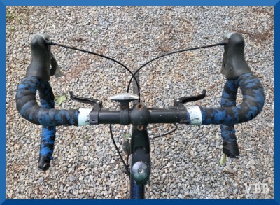 Photo of the handlebars of a bicycle.