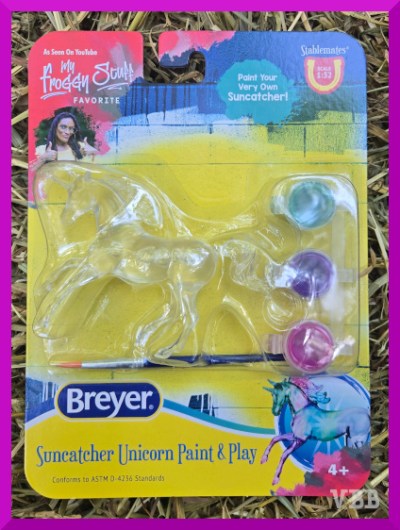 Photo of suncatcher in packaging resting on hay.