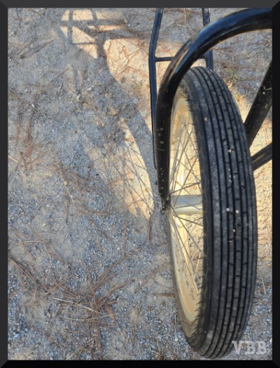 Photo of one wheel of a jog cart.